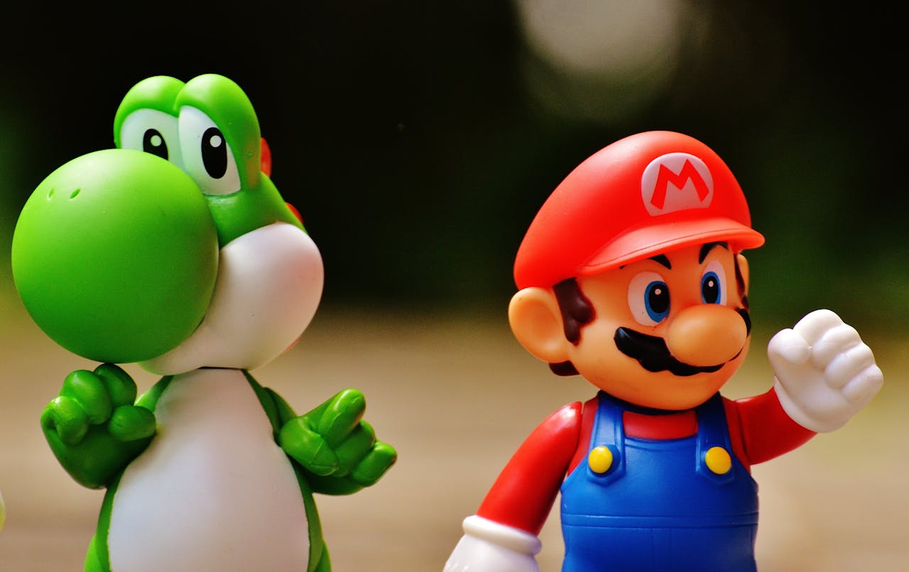 services-img Detailed close-up of Mario and Yoshi figurines from a popular video game franchise.